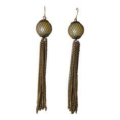 This is part of Chairish’s Costume Jewelry assortment.  These earrings from the 1920s evoke the celebratory feel of the period.  At 4.5” long with a tassel coming from a mesh encased pearl at top they stand out in any room. Elegant Tassel Earrings For Festive Occasions, Tassel Drop Earrings For Evening, Vintage Latkans Earrings For Party, Formal Metal Tassel Drop Earrings, Victorian Dangle Chandelier Earrings For Parties, Victorian Chandelier Dangle Earrings For Party, Elegant Tassel Earrings In Brass, Evening Tassel Chandelier Drop Earrings, Victorian Style Party Chandelier Earrings