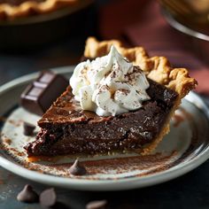 a slice of chocolate pie with whipped cream on top