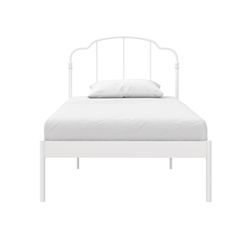 a white bed frame with two pillows on top and one pillow in the bottom corner