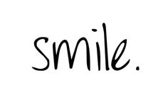 the word smile written in black ink on a white background