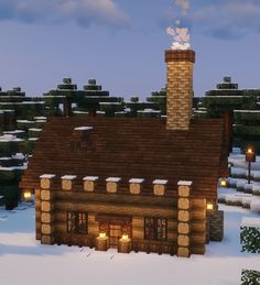 a small log cabin in the middle of a snowy forest