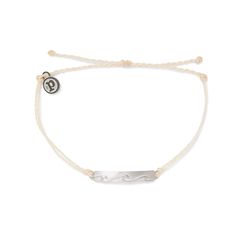 PRICES MAY VARY. FOUNDED IN COSTA RICA - Each accessory is handcrafted by expert artisans and is thoughtfully designed with love. Pura Vida provides sustainable jobs to artisans worldwide and raises awareness for charities through products that give back. UNIQUE CENTERPIECE - This stylish piece features a delicately braided band that is embellished with an eye-catching centerpiece! The lovely charm accentuates the bracelet, completing its strikingly colorful yet elegant look. PLATED BRAND CHARM - This accessory comes with a coated “P” charm made of copper. The signature charm adds a subtle finishing touch to the band while the "P" inscribed on its surface represents our commitment to the "Pure Life." WATERPROOF CONSTRUCTION - This accessory is guaranteed to be 100% waterproof. Surf, snowbo Bracelets Pura Vida, Waves Bracelet, Preppy Bracelets, Wave Bracelet, Pura Vida Bracelets, Best Stocking Stuffers, Aesthetic Life, Bar Bracelet, Hang Ten