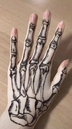 a person's hand with black ink on it