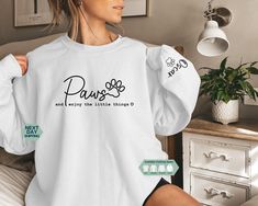 Custom Paws And Enjoy The Little Things Sweatshirt, Dog Quote Shirt, Dog Mom Hoodie, Animal Lover Shirt, Custom Shirt, Gift For Her  HOW TO ORDER  ➧ Please make sure you have read and looked at all sizes and chosen the color that best suits you. ➧ Select clothing style and size from the first drop-down menu. (You can order the design in listing printed on a shirt, sweatshirt or hoodie) ➧ Select from the various clothing colors. ➧ Add your personalized print color to the box, if available. If any Dog T Shirt, Dog Tshirt Ideas, Mom Hoodies, Dog Lover Shirt, Dog Tshirt, Cool Suits, Personalized Prints, Little Things, Dog Mom