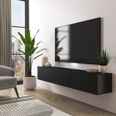 a large flat screen tv mounted to the side of a wall in a living room