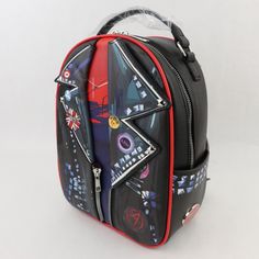 Spider-Man Mini Backpack Spider-Punk Vest Across the Spider-Verse Rock Studs NEW Swinging your way through the Multiverse? Better keep all of your essentials tucked away safely in this mini backpack! From Spider-Man: Across the Spider-Verse, this backpack features a printed design inspired by Spider-Punk's moto vest. Comes with collar appliqué detailing and a front zipper pocket. Complete with adjustable straps and an interior zipper pocket. 8'' x 4'' x 11'' Polyurethane Adjustable straps Interior zipper pocket Punk Vest, Spider Punk, Spider Man Across The Spider Verse, Moto Vest, Across The Spider Verse, Spider Verse, Mini Backpack, Printed Design, Front Zipper