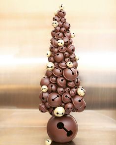 a christmas tree made out of chocolate balls