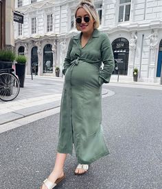 This is one of our go-to styles because the functional buttons make it perfect for nursing and the tie waist means that you can adjust the fit throughout your pregnancy to flatter your bump. Bump, Effortless Style, Nursing