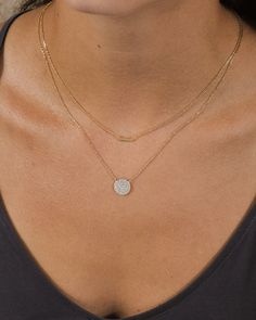 Love luxe layers? This dainty, feminine necklace will become your new fave! It features a smooth bar and a CZ-studded disk. Available in gold and silver tones and adjustable for a perfect fit. Materials: 14K gold or rhodium plated brass, cubic zirconia Features: Measures 16-18" with 2" extender, 0.4X0.1" & 0.45" pendants, Lead & Nickel free, lobster clasp Dainty Chain Necklace, Feminine Necklace, Wedding Necklaces, Solid Gold Bracelet, Necklaces Silver, Layered Necklaces Silver, Dainty Chain, Statement Drop Earrings, Gold Necklace Layered