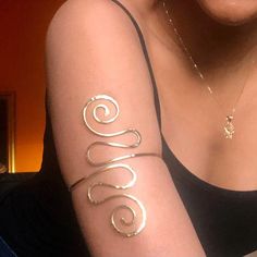 Koru Arm Cuff Available in Silver and Gold and Created to - Etsy Croatia Upper Arm Cuffs, Arm Jewelry, Dope Jewelry, Arm Cuff, Funky Jewelry, Jewelry Lookbook, Jewelry Inspo, Dream Jewelry, Pretty Jewellery