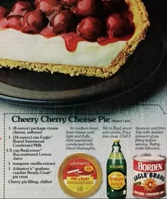 an advertisement for cheesecake with cherries on top and other toppings around it