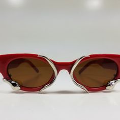 Red Vintage Fashion Frame Sunglasses With Silver Snake Vintage Silver Sunglasses For Party, Vintage Red Sunglasses For Party, Red Cat Eye Sunglasses With Uv Protection For Party, Trendy Metal Sunglasses For Evening Wear, Trendy Red Sunglasses For Evening, Silver Sunglasses For Summer Evenings, Silver Cat Eye Sunglasses For Summer Party, Red Cat Eye Sunglasses For Party, Red Sunglasses For Summer Formal Events