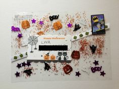 a halloween themed card with lots of sprinkles and other things on it