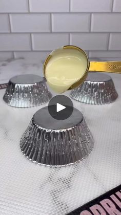 an image of a cupcake being made with cake tins