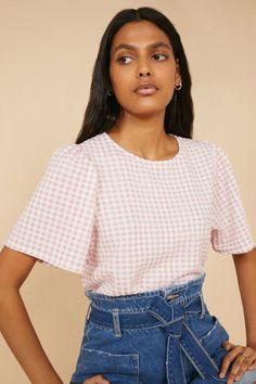 Crafted from a textured fabric in an all over pretty gingham print, this top adds a touch of springtime to any outfit. Pair with straw bags and wide leg denim to complete the look. Couture 2024, Rustic Fashion, Feminine Clothing, Textured Top, Spring Floral Dress, Straw Bags, Fashion Face Mask, Gingham Print