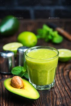 avocado smoothie in a glass with the text how to use avocado in smoothies