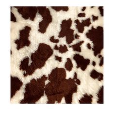 an animal print fabric with brown and white spots on it's fur, as well as