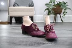 "1960's purple leather and suede lace up oxfords by College Deb, size 7.5.  Y'all its killing me that these are slightly too big for me!  They're SO CUTE.  Classic lace up oxfords in a really fun and cute reddish-purple suede and leather design. Gold tone accents. Lace up at the top of the foot with matching purple laces. Square heel.  Marked College Deb.  Condition: overall great vintage condition. Show signs of wear throughout including some creases to the leather, uneven wear to the leather and suede and wear to the soles. Inner sole is curling at the edges which is really common for older shoes. Scuffs, scratches noted as well. Sturdy and quite wearable. Review detail photos carefully.  Measurements: toe to heel from top: 12\"; width at toe at outside: 2.75\"; width at widest point at Oxford Pumps, Killing Me, Womens Pumps, Old Shoes, Purple Suede, Purple Lace, Purple Leather, Suede Lace, Leather Design