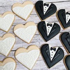 decorated cookies in the shape of heart and tuxedo