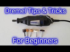 some tools are laying on top of a table with the words dremel tips & tricks for beginners