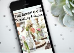 an iphone with the text the broke gal's decorating course on it