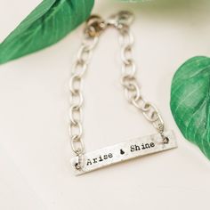 This beautiful Moab bracelet is our favorite Gilead bracelet reimagined! This heaven inspired beauty comes with a hand-stamped rectangle tag on a fun textured chain. Wear as a reminder of what heaven says over you! How it works: Submit the name of who you're ordering for We will pray over this piece and ask God what He is saying for you/them. Our designers create a custom necklace with the word we believe we've heard from God We include a personalized, encouraging card explaining your word and w Trendy Silver Name Bracelet For Everyday, Trendy Personalized Sterling Silver Bracelets, Everyday Spiritual Engraved Bracelets, Meaningful Hand Stamped Jewelry For Friendship, Inspirational Sterling Silver Nickel-free Bracelets, Everyday Personalized Bohemian Bracelets, Everyday Spiritual Metal Bracelets, Everyday Stamped Metal Jewelry, Bohemian Silver Hand Stamped Bracelets