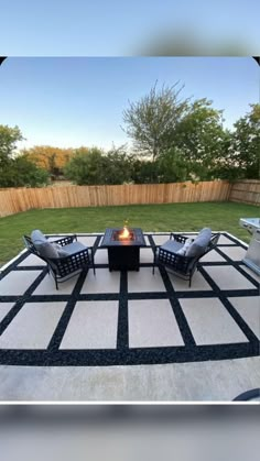 a fire pit sitting on top of a patio