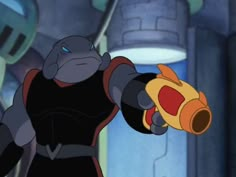 the animated character is pointing at something in his right hand and wearing an orange glove