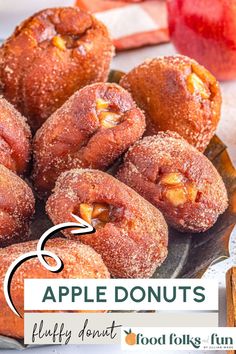 apple donuts on a plate with an apple in the background and text overlay