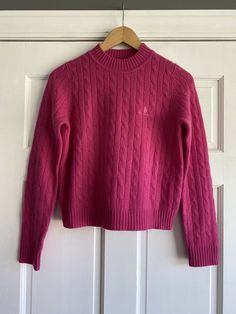 Preowned AO37 Bumi Sirotka Pink Cable Knit Cashmere Sweater Womens Small.  No spots or stains.  No rips, holes, or tears.  Clean and comes from a smoke free home.  Size tag has been cut out, listed size is approximate.  Please use measurements to determine fit.  Measures approximately 18" from armpit to armpit, 24" from top of shoulder to sleeve hem, 19.5" from top of shoulder to bottom hem. Classic Pink Cable Knit Sweater, Classic Pink Knit Sweater, Classic Pink Sweater For Fall, Casual Pink Wool Sweater, Dark Pink Outfit, Dark Pink Sweater, Magenta Sweater, Plain Sweaters, Cashmere Sweater Women