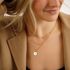 A small, dainty, 18k solid gold heart hangs on a simple rolo chain. Easy to layer but a standout on its own. We love love love this piece, it really is too cute. Use a small, clean bowl and add a dime size amount of clear, gentle dish soap. Add hot water to the bowl, place your fine jewelry in the bowl and soak for 10-15 minutes. Remove and gently clean behind the settings and in between crevices with a soft bristle brush to remove any debris. Rinse, blot dry and shine your gold or platinum jewe Everyday Heart-shaped Gold Plated Chain Necklace, Everyday 14k Gold-filled Necklace With Heart Charm, Minimalist Gold-plated Heart Charm Necklace, Elegant Gold-plated Heart Charm Necklace, Minimalist 14k Gold-filled Necklace With Heart Charm, Gold Necklace Simple, Platinum Jewelry, Gold Necklace Set, August Birthstone Jewelry