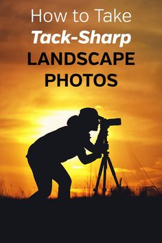 the silhouette of a man taking pictures with a tripod in front of an orange sky