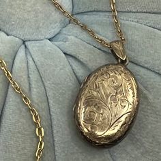 Beautiful Vintage Gold Over Sterling Engraved Or Etched Locket With 1/20 12 Kgf Chain Link Necklace: Carry A Favorite Photo, Note Or Lock Of Hair In This Lovely Vintage Locket! - Etched Floral Design On One Side And Mekhala, Goddess Of Lighting, On The Other Side - Chain Link Necklace Marked '1/20 12 Kgf' (Gold Filled) On The Clasp - Double Locket Marked "Siam Sterling' On Both Sides - Spring Ring Clasp - Circa: Most-Likely Pre-1939 But Could Be As Late As The 1950's, 1960's Or 1980's (Siam Became Thailand In 1939) Accepting Offers! Bundle & Save! Don’t Have A Poshmark Account Yet? Sign Up And Get $10 Off Your First Purchase With My Invitation Code: Blendyourstyle Approximate Meas Golden Locket Necklace, Antique Lockets Gold, Vintage Gold Locket Necklace, 1880s Jewelry, Unique Locket Necklace, Antique Gold Locket, Vintage Gold Jewelry, Unique Jewelry Vintage, Unique Locket