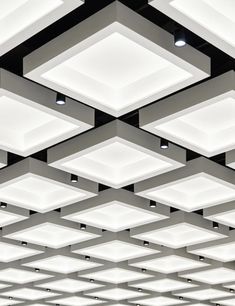 the ceiling has many square lights on it