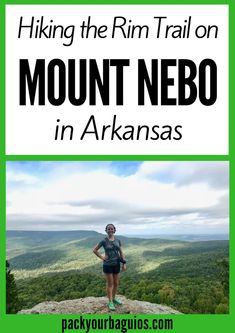 a hiker standing on top of a mountain with the text hiking the rim trail on mount nebo in arkanas