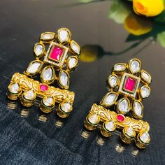 These are a beautiful pair of Earrings, made with beautifully Kundan beaded. These earrings work well with all types of clothing, whether it be formal attire or a casual party. Option 1 : Red Color (E716) Option 2 : Green Color (E717) Eye-catching and unique jewellery that will set you apart. Gift this piece to a loved one, and see their face light up with joy. Best for gifting or for personal use, wear it to any occasion and be in the spotlight. Types Of Clothing, Kids Handicraft, Saree Jewellery, Silver Pooja Items, Glass Bangles, Silver Toe Rings, Gold Chain With Pendant, Ruby Beads, Kundan Earrings