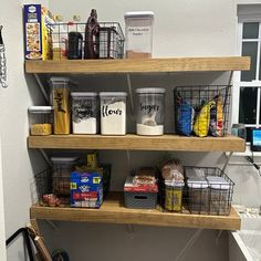 the pantry shelves are full of food and condiments, including rice flakes