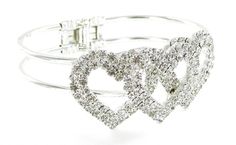 "Oval Shape Center Hinge Crystal Rhinestone Hearts Bridal Cuff Bangle Bracelet Bangle Size : 2.75\"x 2\"+- High: 0.35\"+- Hearts Size : 1\"x 2.25\"+- Clear Rhinestones /Silver Toned Hinge Bracelet / Hinge Opens at Center of Bracelet Luxurious look inexpensive shimmering rhinestone Bangle Bracelet. Ideal to wear on special occasions like Wedding,bridal shower, Prom, Pageant, Homecoming, Parties, Formal Affairs, Birthday, Valentine's dinner, Mother's Day or Anniversary etc. Item # BS-347" Wedding Jewelry Crystal, Bridal Cuff Bracelet, Valentine's Dinner, Hinge Bracelet, Bridal Cuff, Crystal Wedding Jewelry, Bracelet Wedding, Face Earrings, Cuff Bangle Bracelet