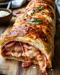 a large piece of food that is on a cutting board