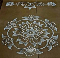 an intricately designed sidewalk with white chalk on it