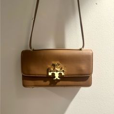 Received As A Gift, Minor Wear And Tear The String Is Fraying In The Bottom (See Last Picture) *Never Authenticated* Classic Tan Shoulder Bag With Turn-lock Closure, Tan Evening Bag With Brass Hardware, Tan Evening Bags With Brass Hardware, Chic Tan Shoulder Bag With Brass Hardware, Tan Rectangular Shoulder Bag With Turn-lock Closure, Tan Crossbody Bag With Magnetic Closure, Timeless Tan Bag With Brass Hardware, Elegant Tan Shoulder Bag With Turn-lock Closure, Tan Shoulder Bag With Brass Hardware For Everyday Use