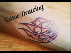 a tattoo is shown on the arm of a person's arm, which reads tattoo drawing