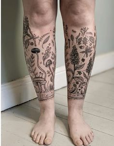 a person with many tattoos on their legs