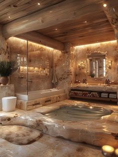 a luxurious bathroom with stone walls and flooring