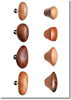 six different types of wooden knobs on a white background with the top one turned upside down