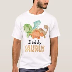 Celebrate your little one's special day with our "Dad of the Birthday Boy" T-shirt! Featuring playful dinosaur graphics and bold lettering, this comfy tee is perfect for the proud dad. Stand out in style and make unforgettable memories. 

#DinosaurDad #BirthdayBoyDad #Daddysaurus #FamilyFun #DadStyle #PartyReady #StylishDad #TeeTime #FamilyFashion #UniqueTee Dino Bebe, Dinosaur Family, Baby Dinosaur, Creative Gifts For Boyfriend, Dad Fashion, Baby Dinosaurs, Dinosaur Birthday Party, Boy Shirt, First Birthday Outfits