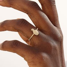 Elevate your summer style with our 14k Solid Gold Pave Pineapple Ring. Crafted with precision and embedded with sparkling stones, this dainty pineapple ring adds a touch of tropical allure to your look. It's not just jewelry; it's a symbol of warmth and friendship. Ring Details ❥ Gold KT: 14k 18k 10k Solid Gold ❥ Gold Color Options; Yellow Gold, White Gold, Rose Gold ❥ Band Width: 1.30 mm ❥ Top Width: 9,05x3.80 mm ❥ Thickness: 1.45 mm ❥ Top Thickness: 1.80 mm ❥ Gemstone: AAA Grade White Cubic Zi Gold Wedding Rings For Summer, Gold Rings For Summer, Gold Ring For Summer Promise, Gold Promise Ring For Summer, Summer Gold Promise Ring, Dainty Summer Promise Ring, Pineapple Ring, Pineapple Jewelry, Pineapple Rings