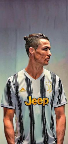 a man in a soccer uniform with his hair styled into a top knot and the word jeep on it