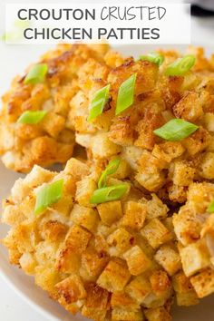 crisped chicken patties on a white plate with green onions