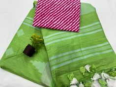 This is a beautiful organic cotton handloom saree with silver zari border and zari lines pallu design . Fabric - Cotton  Technique - Handloom Saree length - 5.5 mtr. Blouse - 1 mtr. Pure cambric cotton blouse in contrast print . Easy wash and care . Please note - color may be vary a little due to sunlight and photography . Please message us after purchasing in case you want fall and Pico done it not . No extra charges for fall and Pico but inform us . Blouse stitching is also available . Green Cotton Handloom Dupatta, Green Handloom Cotton Dupatta, Green Cotton Dupatta With Zari Weaving, Green Cotton Handloom Saree, Green Cotton Traditional Wear With Zari Weaving, Green Cotton Saree With Zari Weaving, Unstitched Cotton Saree With Border, Unstitched Cotton Saree With Border Detail, Multicolor Cotton Saree With Border